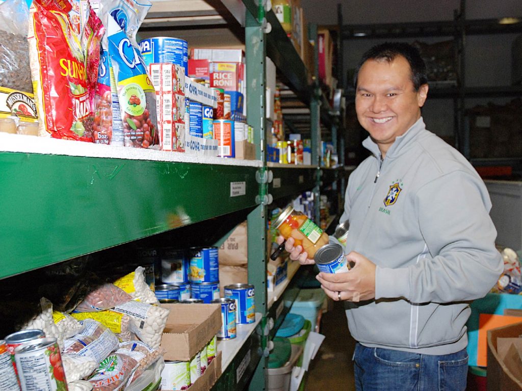 employee at food drive event